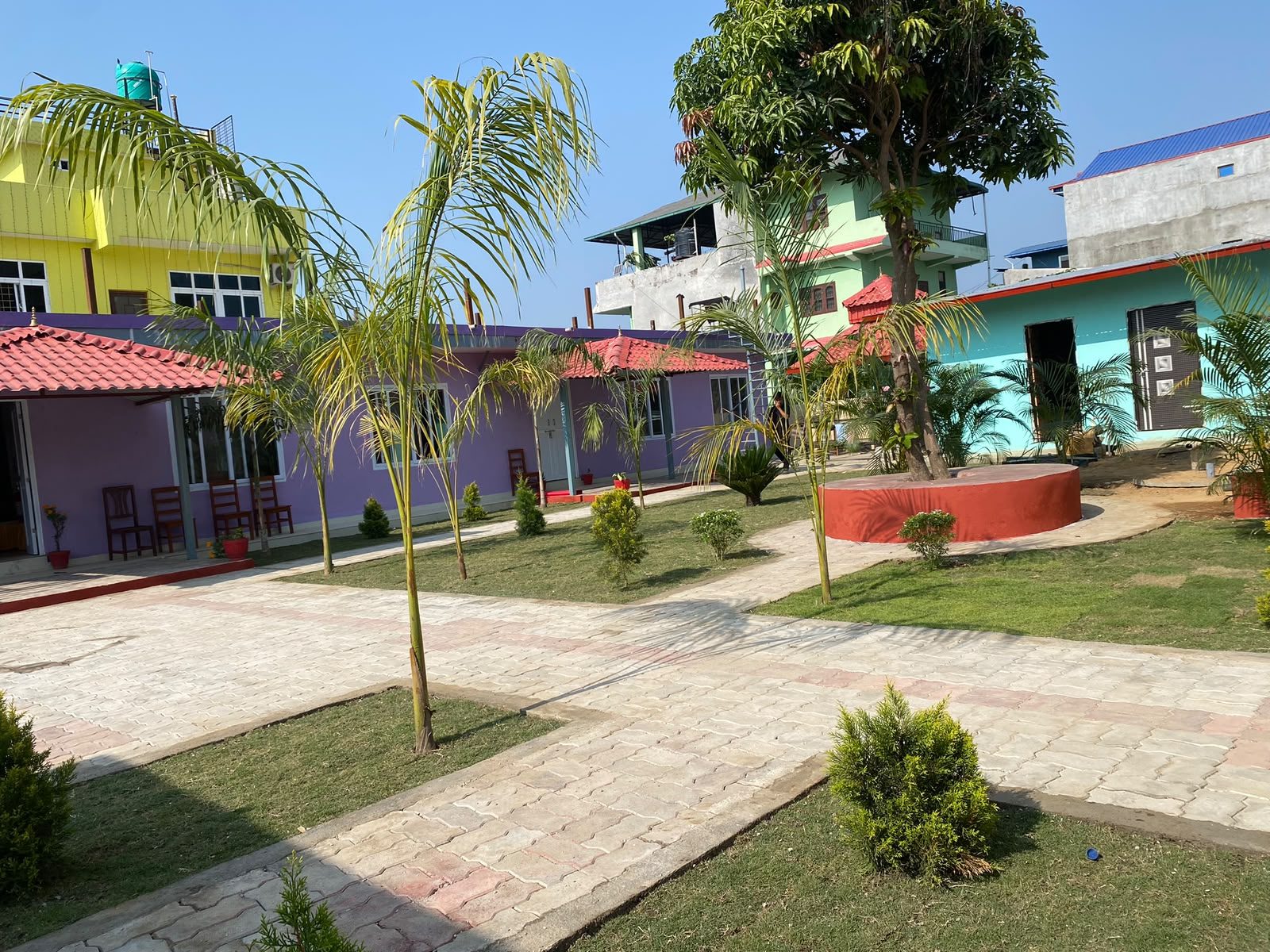 Private garden cottages at Hotel Kavya Inn