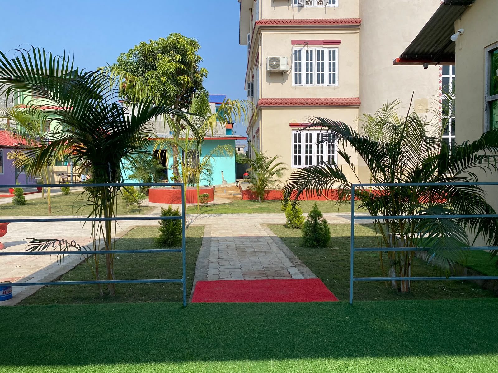 Event pathway and garden setup at Hotel Kavya Inn