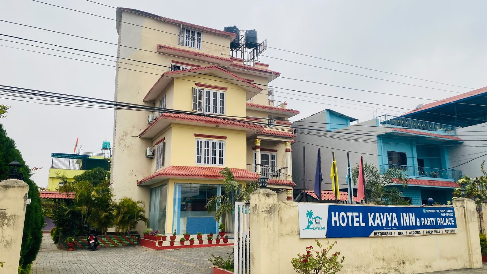 Hotel Kavya Inn & Party Palace signboard and facade